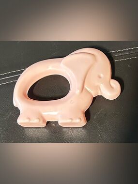 vintage 1970s Sanitoy elephant baby rattle or teether. Hard plastic, hollow